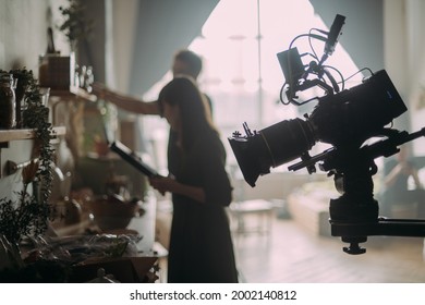 Professional Cinema And Video Camera On The Set. Shooting Shift, Lighting Fixtures, Shooting Equipment And The Team. Technique Of Modern Filming And Advertising.