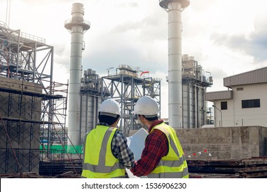 Professional civil engineer project construction cogeneration electrical plant. Engineer foreman discussion concept work.
