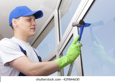 Professional Cleaning, Man Washes Window