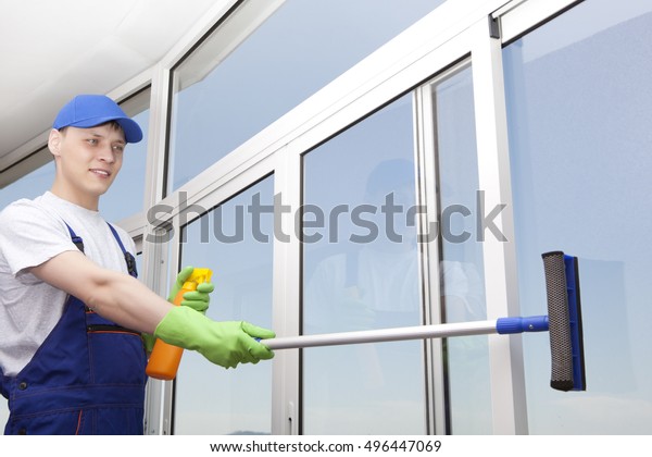 Professional Cleaning Young Man Washes Window Stock Photo Edit Now