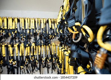 Professional climbing equipment hanging at amusement park warehouse - Shutterstock ID 1854437209