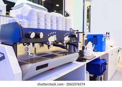 Professional coffee machine. Coffee machine at catering establishment. Automatic machine for preparing coffee drinks. It has heating system for cups. Equipment for hospitality business concept