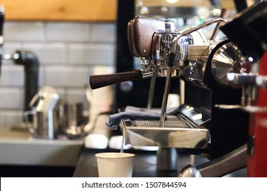 Professional coffee machine. Close up of a coffee holder. 