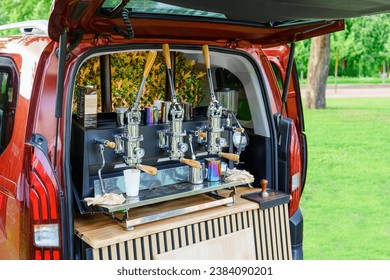 Professional Coffee Machine Installed in the Back of a Car: Coffee Service for Outdoor Events and Open Air