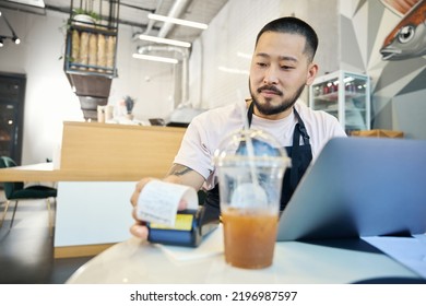 Professional Coffee Shop Worker Making A Copy Of A Payment Receipt