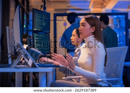 Professional computer engineer working on a new software technology design in the office Night, focus or programmer review search engine process, software or IT database development