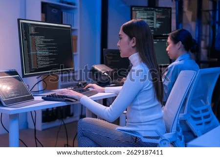 Professional computer engineer working on a new software technology design in the office Night, focus or programmer review search engine process, software or IT database development