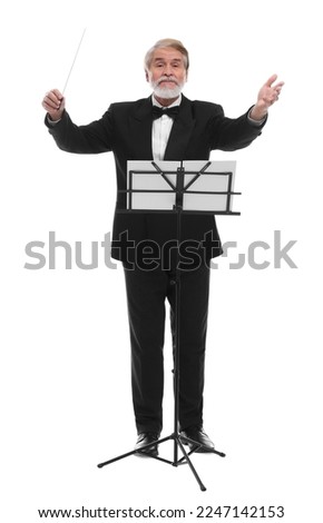 Professional conductor with baton and note stand on white background