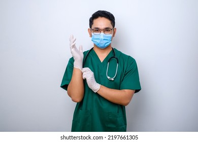 Professional And Confident Smiling Asian Physician, Nurse Wear Rubber Gloves And Medical Mask For Patient Examination, Isolated Over White Background