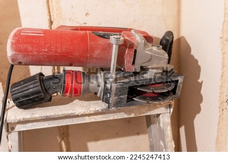 professional construction power tool for cutting grooves in concrete [[stock_photo]] © 