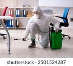 Professional contractor doing pest control at office