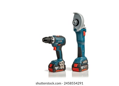 Professional cordless drill driver and angle grinder power tools isolated on a white background with copy space; instruments for DIY or trade isolated on white; drill and angle grinder side view
 - Powered by Shutterstock