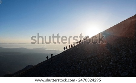 Similar – Image, Stock Photo Hiking in mountains. Mountain landscape. Scenic view of mountain peaks. Panoramic view. Natural scenery. Beautiful background