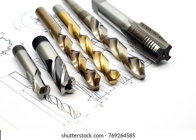 Professional cutting tools used for metalwork. Multi-flute drill, broach bit, Stainless Drill bit, Tap for thread