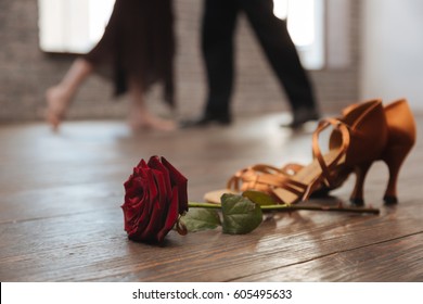 Professional Dancers Tangoing In The Dance Studio