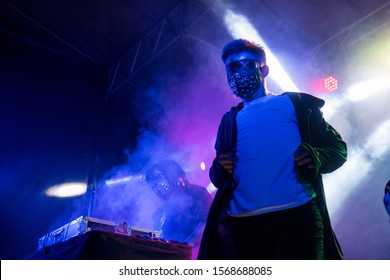 Professional Dancers - Young White Guys In Masks Is Dancing Emotional Inflammatory Club Dance On Stage During A Dubstep Party, DJ, Black And White, Rhythm, Tempo, Movement, Happiness, Performance, PJ