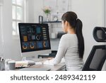 Professional data analyst using data visualizations dashboard on computer monitor for data business analysis and Data Management System