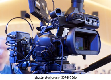 Professional digital video camera. tv camera in a concert hal. 
Digital TV camera