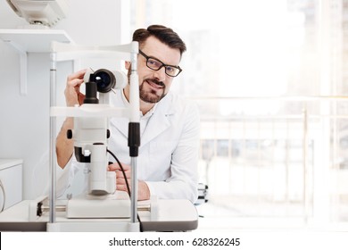Professional distinguished eyesight specialist at work - Shutterstock ID 628326245