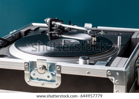 Professional DJ Turntable in Flightcase Playing Record