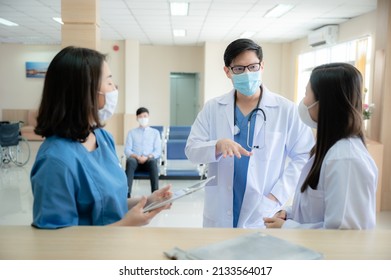 Professional Doctor And Medicine Person Team Have A Conversation To Talking In Hospital About Medical Health Care Work, Wearing Surgical Face Mask