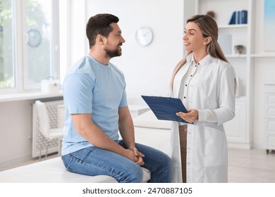 Professional doctor working with patient in hospital - Powered by Shutterstock