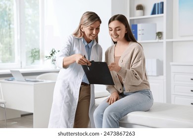 Professional doctor working with patient in hospital - Powered by Shutterstock