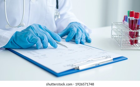 Professional doctors perform tests from samples of blood tests to diagnose virus infections analysis and sampling of infectious diseases, medical concepts, and health care.