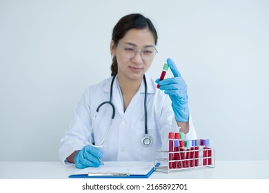 Professional Doctors Perform Tests From Samples Of Blood Tests To Diagnose Virus Infections Analysis And Sampling Of Infectious Diseases, Medical Concepts, And Health Care.