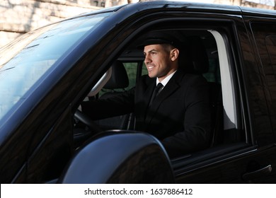 Professional Driver In Luxury Car. Chauffeur Service