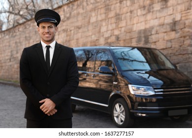 Professional Driver Near Luxury Car On Street. Chauffeur Service