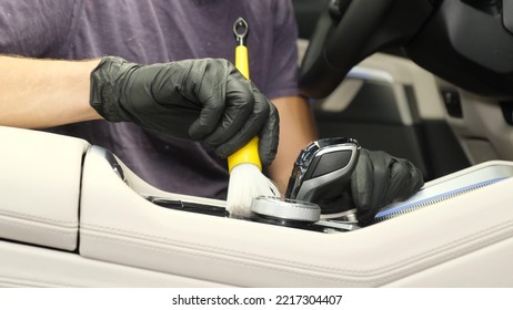 Professional Dry Cleaning Of The Car Interior. Hands In Rubber Black Gloves For Cleaning The Car.