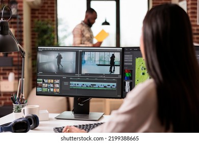 Professional editor using montage to edit film in multimedia software for post production. Editing movie footage with sound and creative effects, creating audio and visual content.