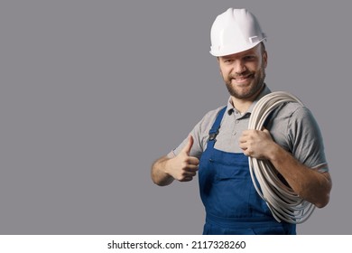 Professional Electrician Giving A Thumbs Up And Smiling