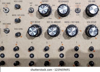Professional electronic synthesizer board controls. Synth panel for composing musical tracks audio cables connecters to analog sound recording device - Shutterstock ID 1219659691