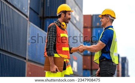 Professional engineer container cargo foreman in helmets working standing and using walkie talkie checking stock into container for loading.logistic transport and business industry export Stock fotó © 