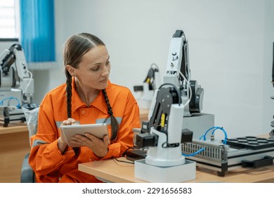 Professional Engineer are inspection Robot arm,Testing Robot Arm at Lab.