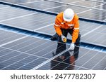 Professional Engineer Service Solar Panel. Worker Maintenance Cleaning Replacing Solar Panel. Solar photovoltaic panel system in Industry roof. Saving Energy with Clean Power.