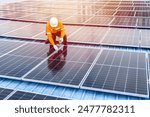 Professional Engineer Service Solar Panel. Worker Maintenance Cleaning Replacing Solar Panel. Solar photovoltaic panel system in Industry roof. Saving Energy with Clean Power.