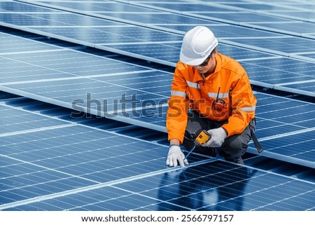 Professional Engineer Service Solar Panel. Worker Maintenance Cleaning Replacing Solar Panel. Solar photovoltaic panel system in Industry roof. Saving Energy with Clean Power.