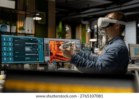Professional engineer using VR headset and AI tech to create a spaceship for video game, moving assets in 3D program for the spatial environment. Virtual development for the internet.