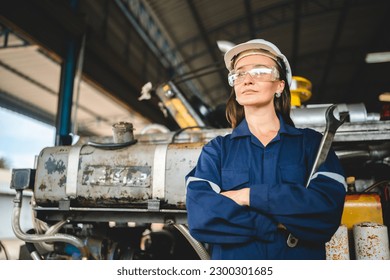 Professional engineer women worker or mechanical foreman working to maintenance and check in factory warehouse, engineering women training workshop for factory operators, Business factory industry. - Shutterstock ID 2300301685