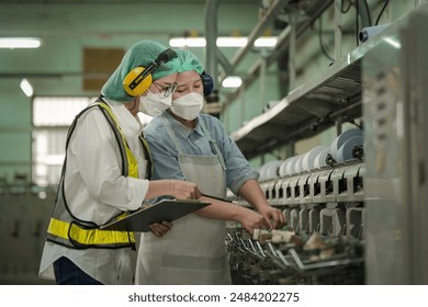  Professional engineer women, worker, mechanical, maintenance, engineering women training. Engineer woman worker work design program machine in Textile factory. industry. - Powered by Shutterstock