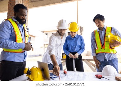 Professional engineering team working : Unity and teamwork. construction worker Architects and contractor working together at building under construction site. Engineering in safety harthat helmet
