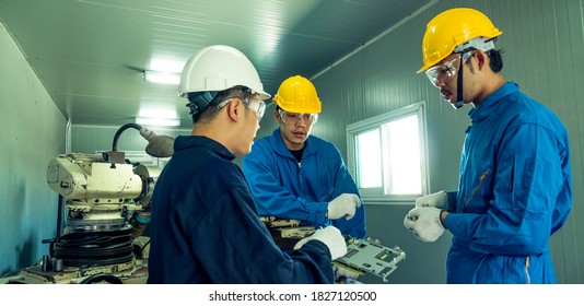 Professional engineering walking discuss inspecting with engineer team machinery factory area. Manager hand use tablet listenreport paper for internal audit. Quality assurance for manufacturing.  - Shutterstock ID 1827120500