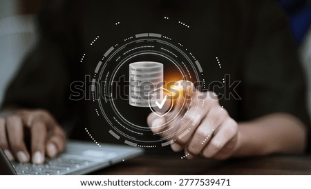 Professional ensuring data security with virtual shield on database server. Concept of cyber protection, information privacy, and corporate network security in digital world.