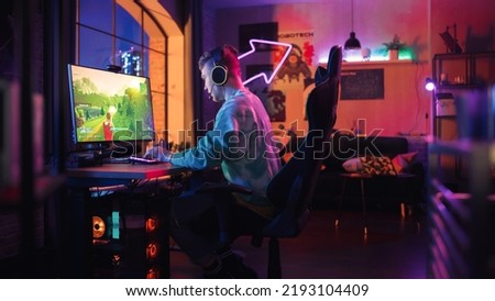 Professional eSports Gamer Winning Online Tournament. 3D Shooter Video Game with Lots of Action and Fun on His Powerful Personal Computer at Home. Cyber Gaming Stylish Retro Neon Room. Real Gameplay.