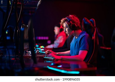 Professional esports players at an online game tournament. The cyber team plays computers and trains - Shutterstock ID 1990896035