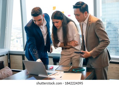 Professional executive business people group meeting and discussion in conference room, businessman serious talking or sharing idea from tablet and laptop computer to the team  - Shutterstock ID 1842224395