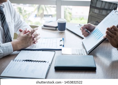 Professional executive manager, Business partner discussing ideas marketing plan and presentation project of investment at meeting and analyzing on document data, financial and investment concept. - Shutterstock ID 1453832522